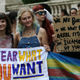 Protesters demonstrate against France's ban of the burkini, outside the French Embassy in London, Britain August 25, 2016. REUTERS/Neil Hall - RTX2N0KB